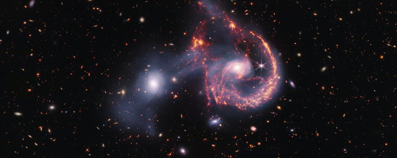 4億6500万光年の彼方で笑う銀河：JWSTが捉えたArp 107の壮大な